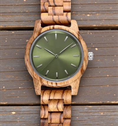 Man wearing Arden VIII green dial Zebrawood watch